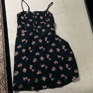 Mini dress size M black with pink flowers and green leaves